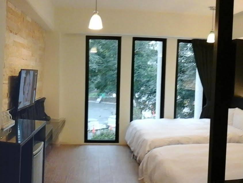 Smile Ark Homestay Юйчи Экстерьер фото